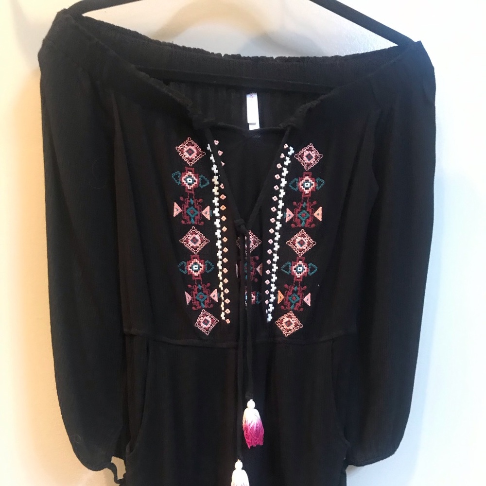 Black long sleeve romper with tribal detail